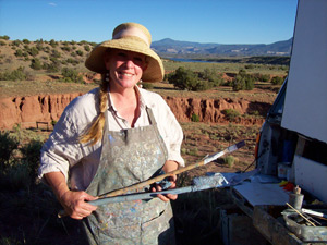 using a trowel to paint a landscape