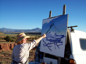 painting a landscape on a large canvas