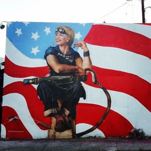 Political art: Hillary with flame thrower street art