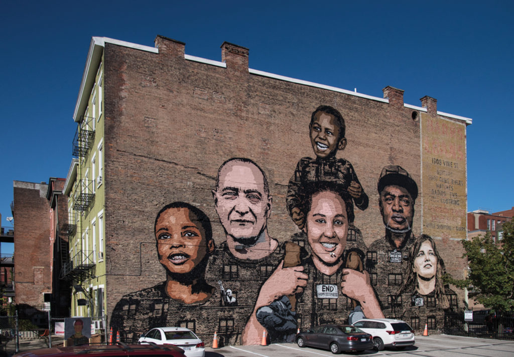 Faces of Homelessness mural by ArtWorks |